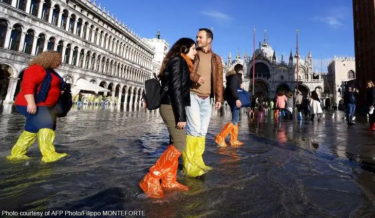 Cover your feet with plastic bags