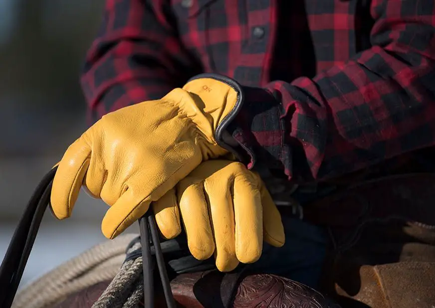 cowboy also wears gloves