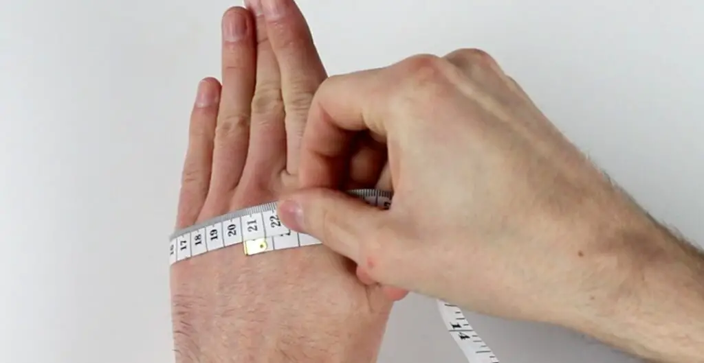 Measure the widest part of your hands