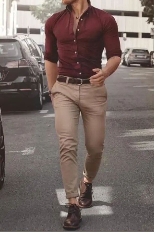 Maroon shirt with a pair of light brown jeans