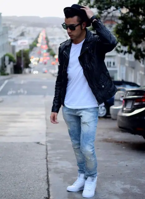 Black leather jacket and light blue jeans